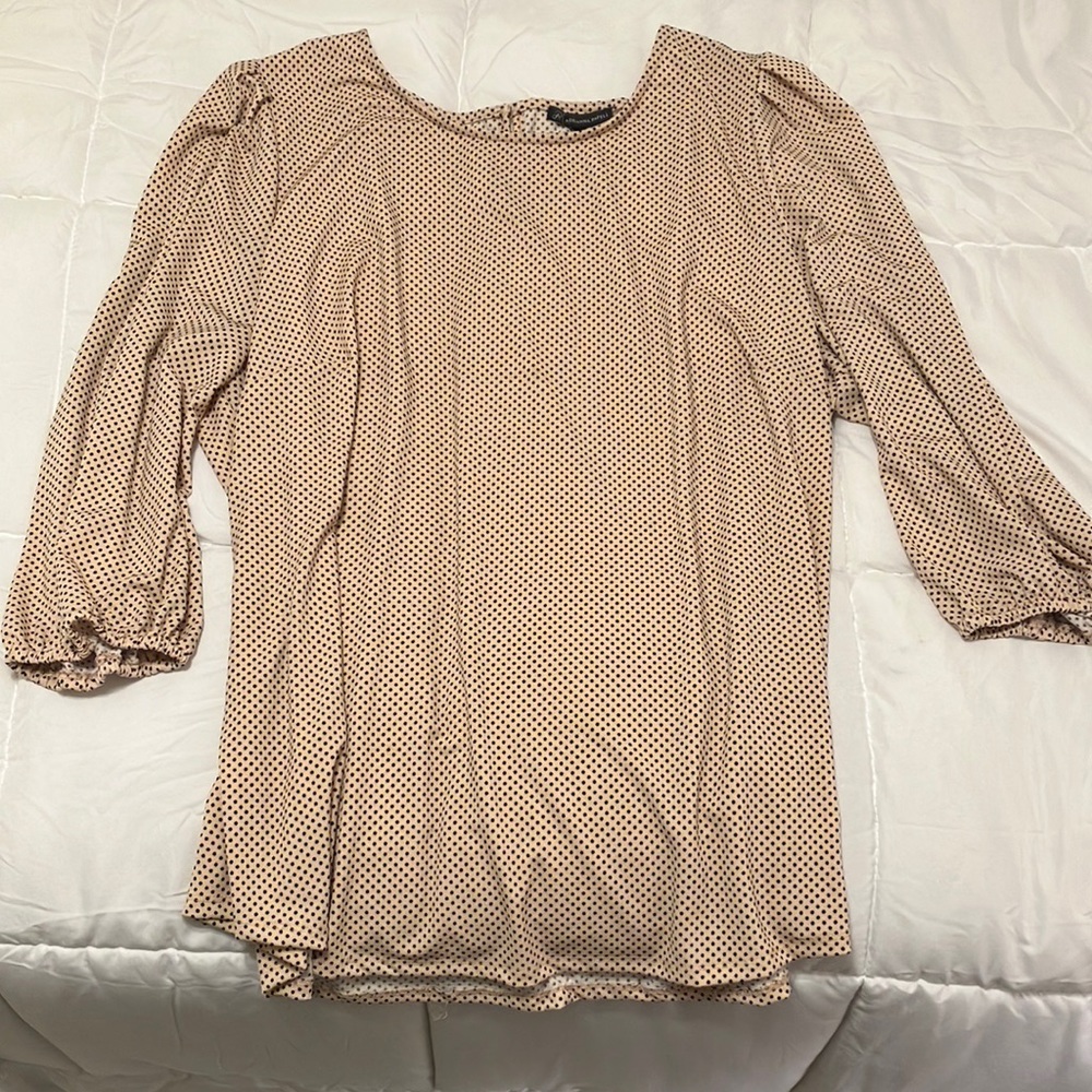 Women’s top, rose blush with black dots.